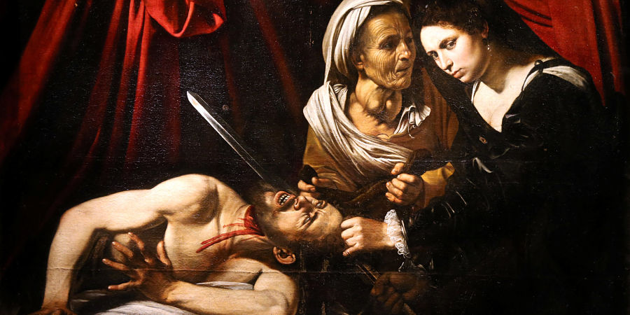 A detail of a painting entitled "Judith Beheading Holofernes" is pictured during its presentation in Paris, France, April 12, 2016, that might have been painted by Italian master Caravaggio (1571-1610) and was discovered in an attic in Toulouse and could be worth more than 100 million euros. REUTERS/Charles Platiau FRANCE-CARAVAGGIO/