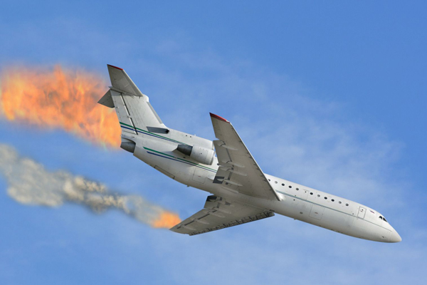 The image of burned airplane falling to the sea